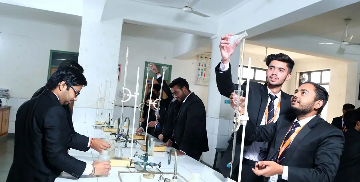 Chemistry laboratory with students at lab benches