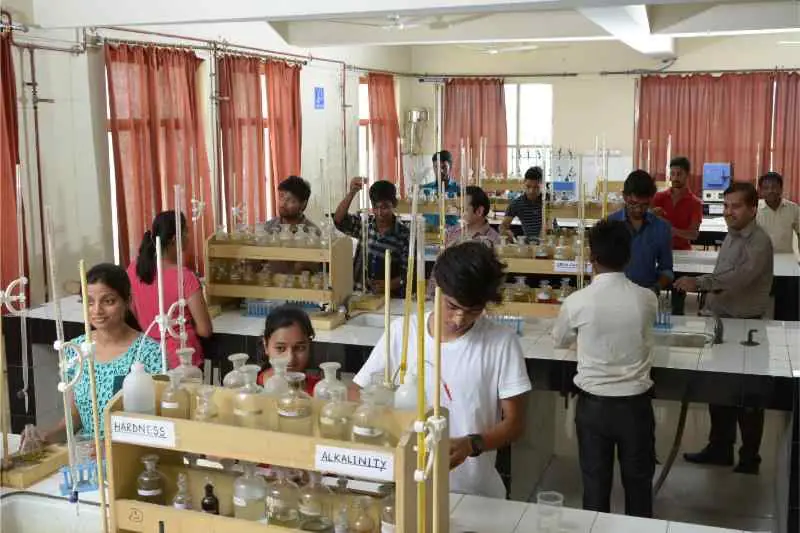Chemistry laboratory with students at benches