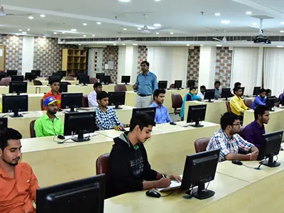 Computer lab with rows of workstations