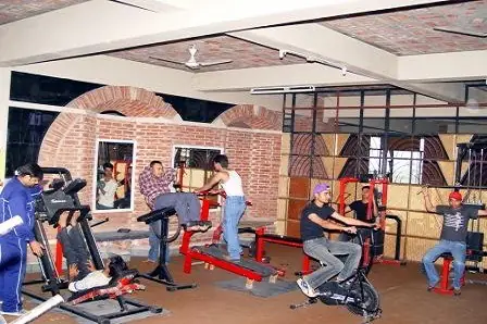 Hostel gym with exercise equipment