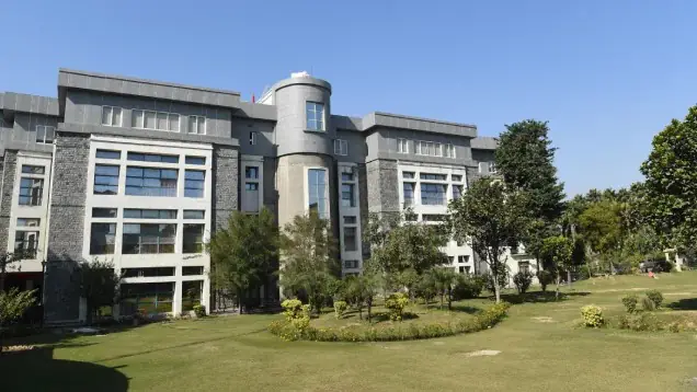 Campus academic building with front lawn