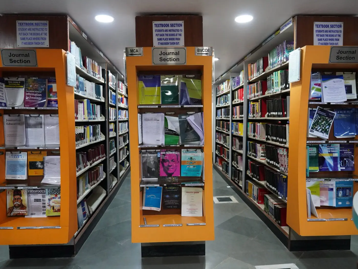 Library book stacks and journal section