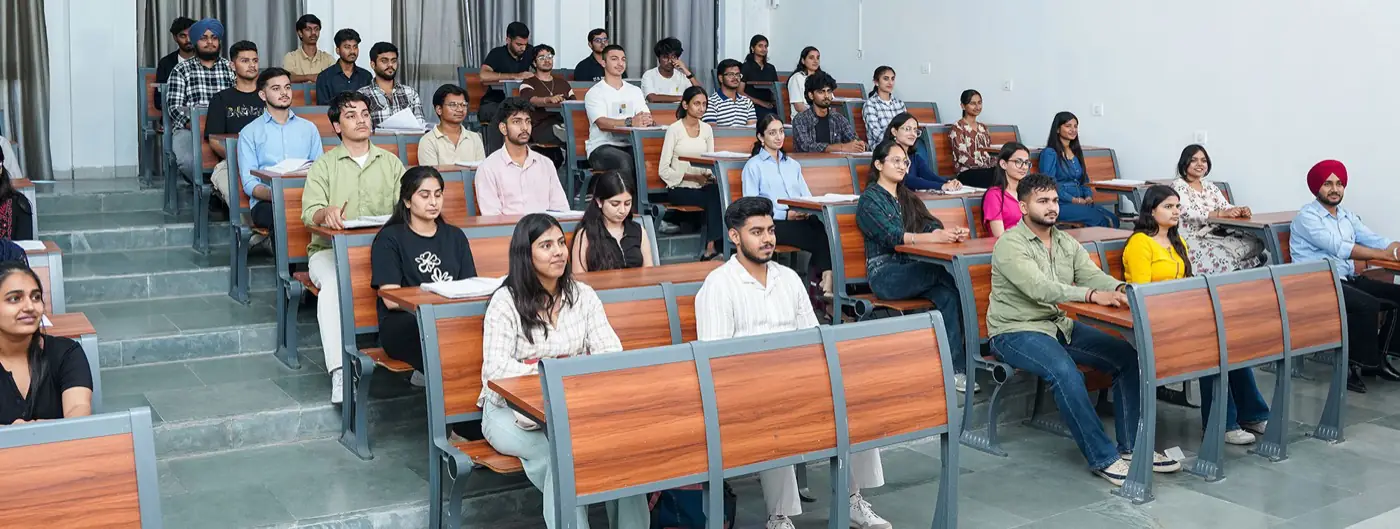 Tiered lecture hall with students