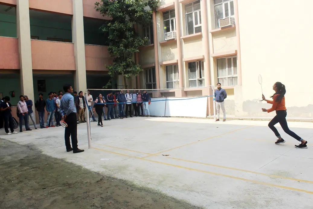 Outdoor badminton court between academic blocks