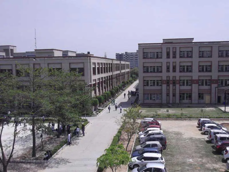 Elevated view of academic blocks, avenue and parking