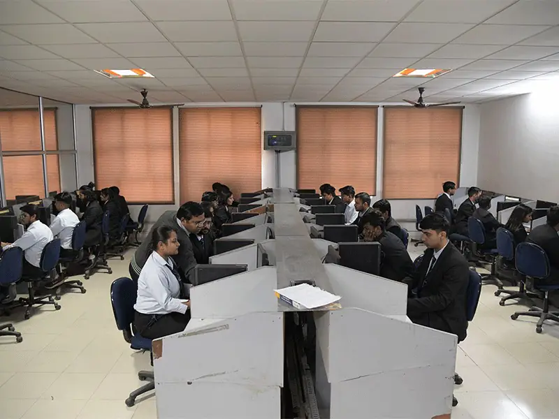 Computer lab with rows of workstations