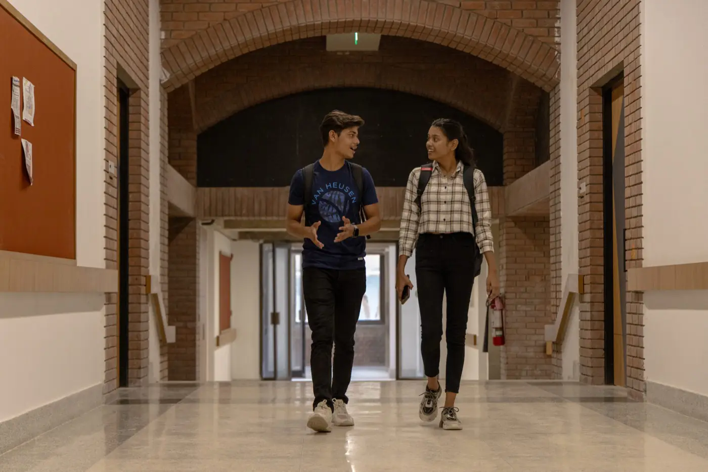 Brick-arched corridor inside academic block