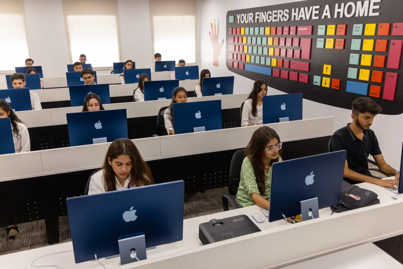Apple iMac lab with students at work