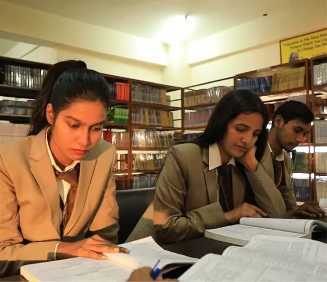Students reading in the library