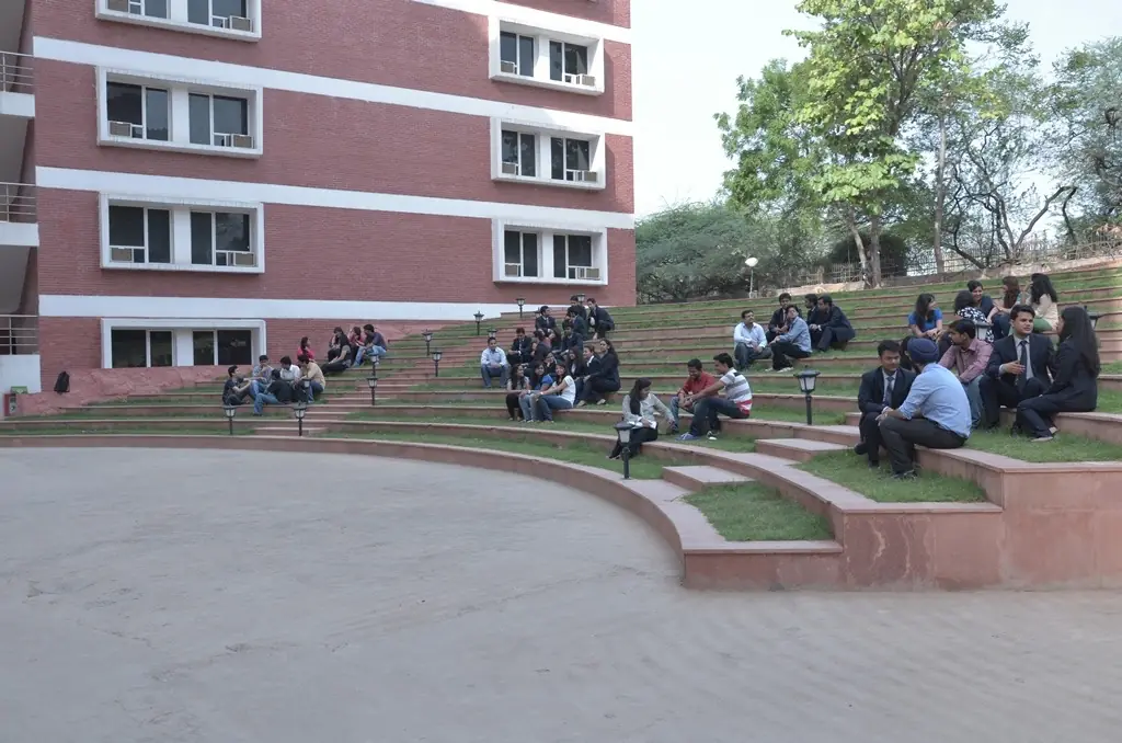 Open-air amphitheatre with students seated