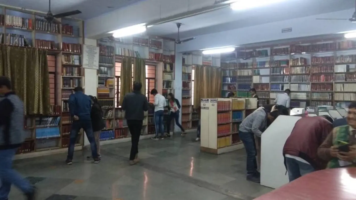 Library stacks and reading area, UG campus