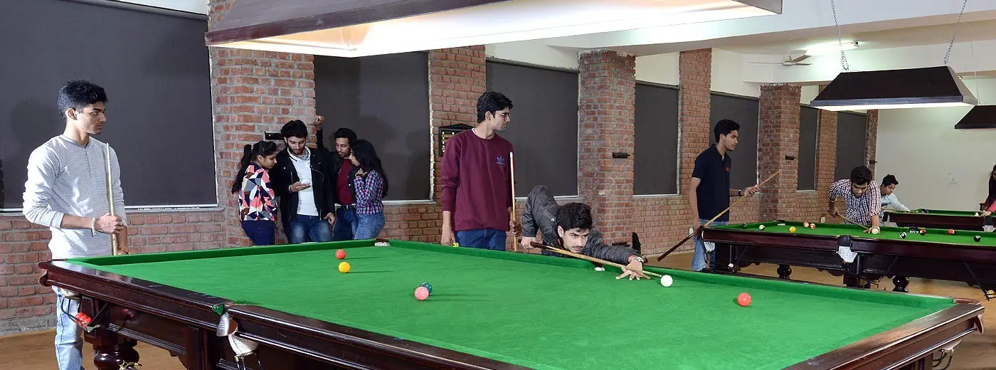 Indoor recreation room with snooker tables