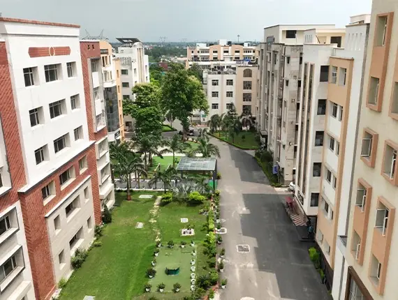 Elevated view of campus blocks along the internal road and lawns