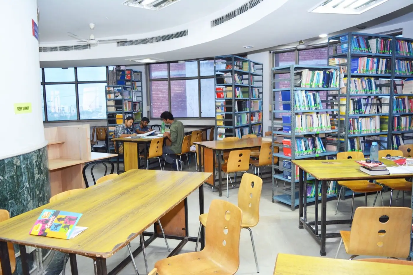 Library reading area with bookshelves