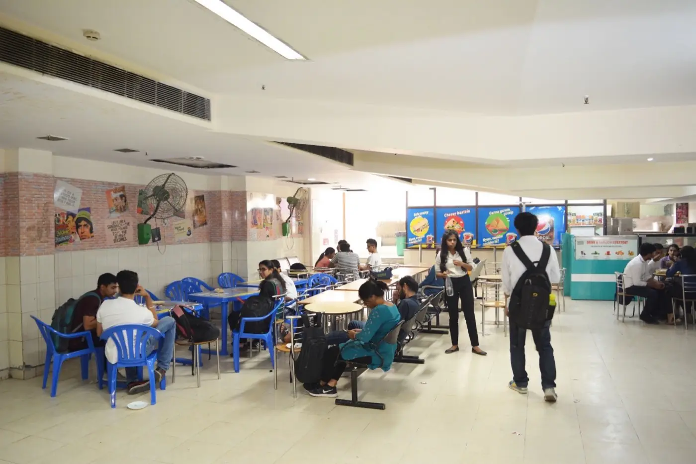 Canteen seating area with students