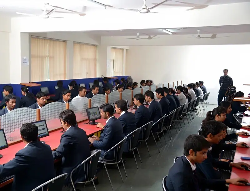 Computer centre with rows of workstations