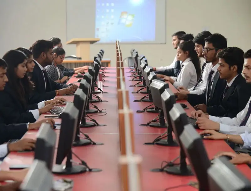 Students working at computers in the computer lab