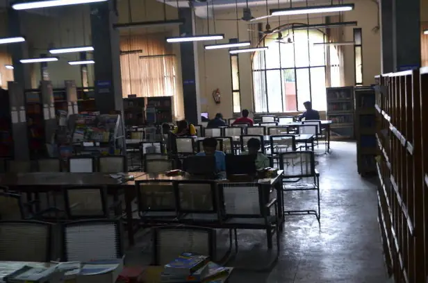 Library reading hall with bookshelves